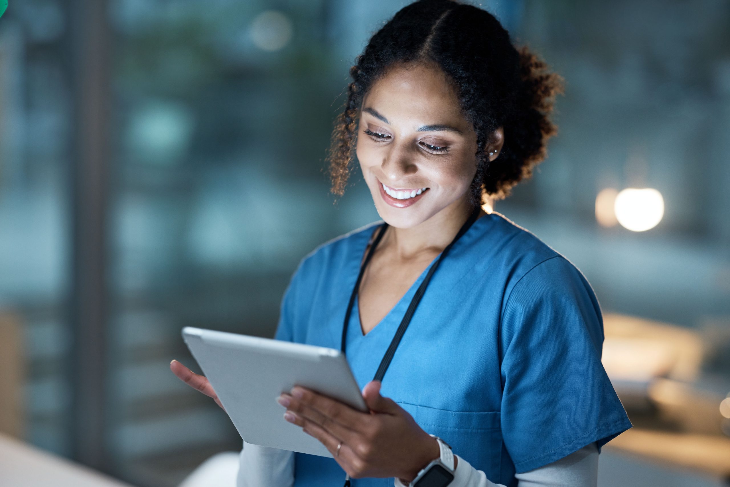 Female clinician using tablet