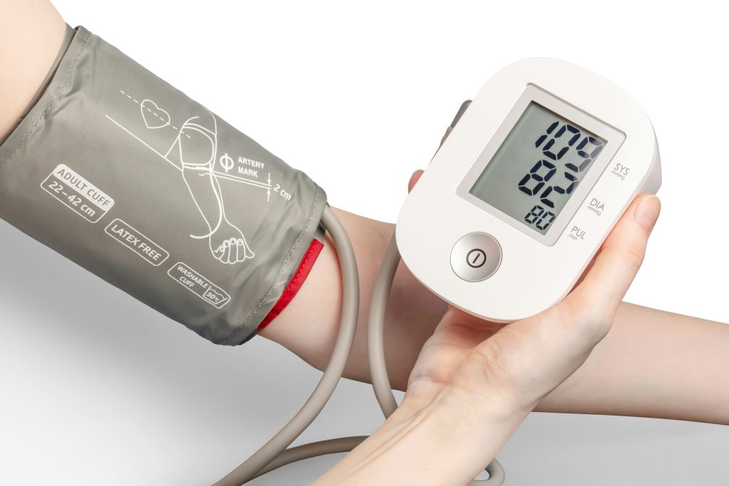 Blood pressure monitor being used