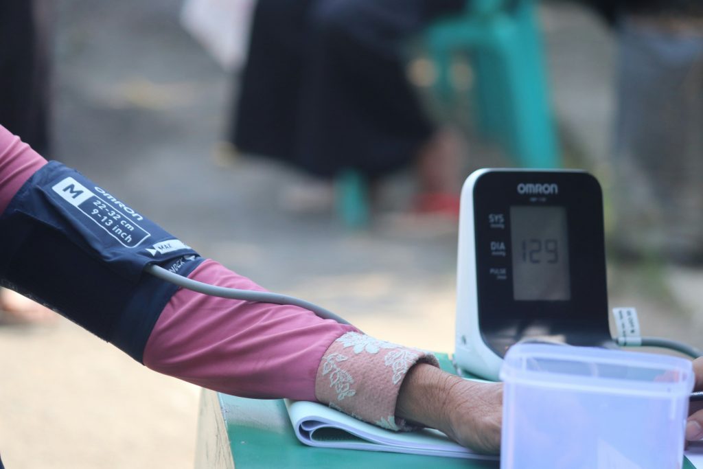 Blood pressure monitor being used