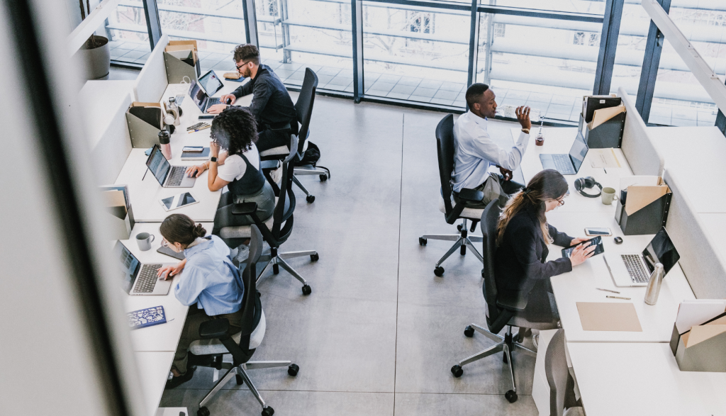 Image looking down on people working at desks