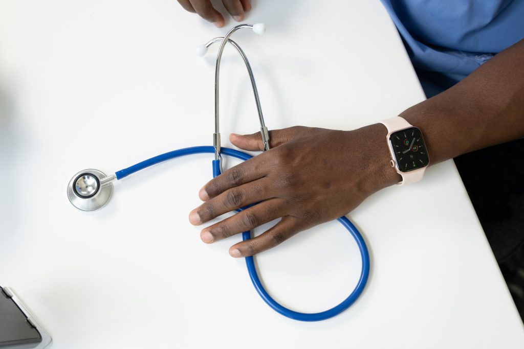 A closeup of a hand and stethoscope